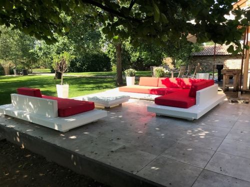 Loungeset standaard Ibiza hoek wit onderstel en oranje kussens