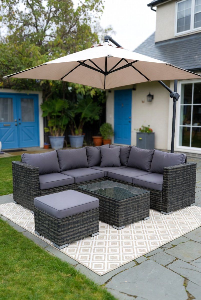 luxe polyrattan hoek loungeset met kussens en glazen tafel
